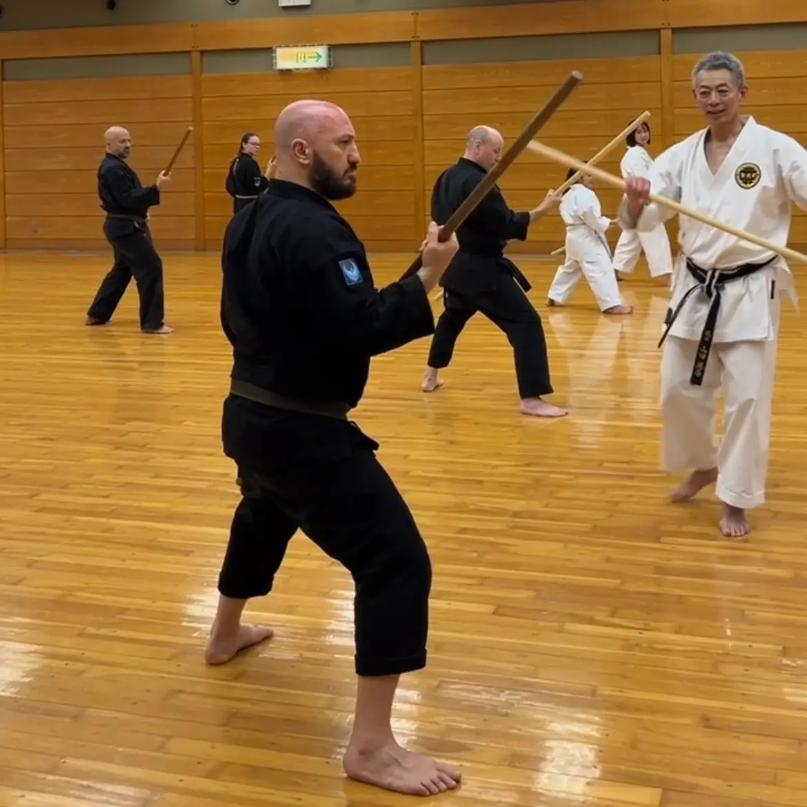 Olgun Tiltay in Nagoya Japan practicing Kobudo with Hideki Yamada Sensei [9th Dan Shorin-Ryu Karate]
